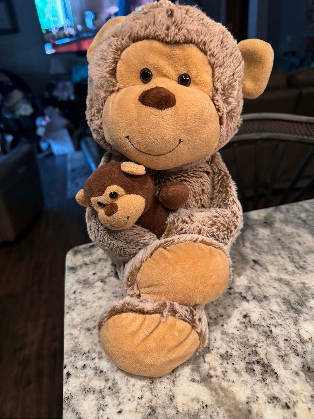 Animal Adventure plush monkey holding a smaller baby monkey